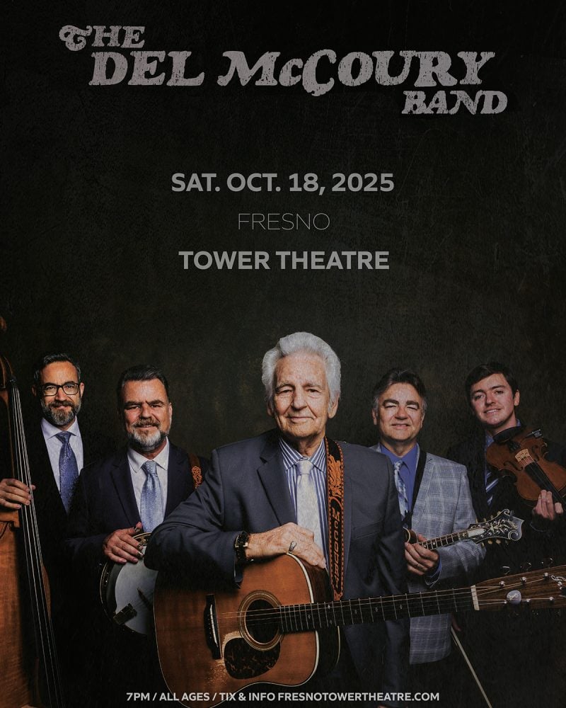 Five men in suits, holding musical instruments, stand together in front of a dark background with text promoting The Del McCoury Band concert on October 18, 2025, at Fresno's Tower Theatre.